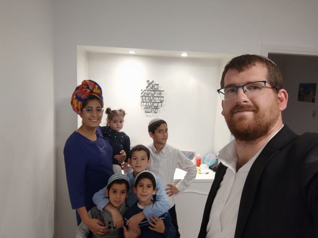 Con su esposa y sus hijos