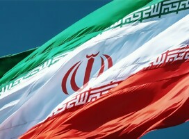Bandera de Irán (Foto: Dina Drakhshani, Unsplash) Irán, participando en las masacres…entre Siria y Najal Oz
